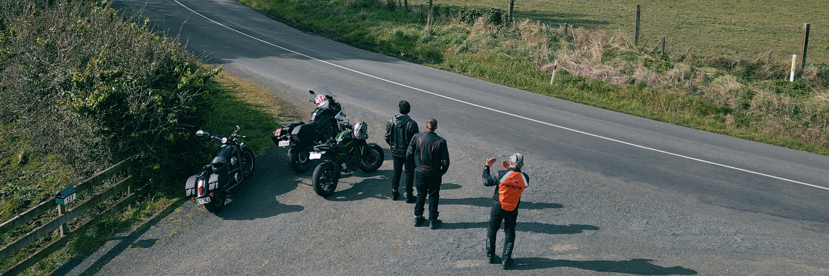 Group of riders and Ride Forever instructor practicing cornering
