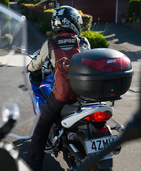 View of braking motorcycle from behind