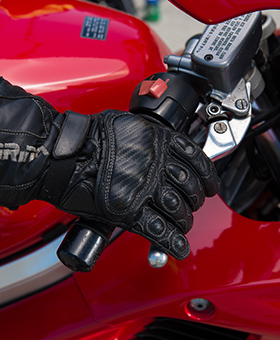 Close up of hand on brake