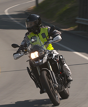 Adventure bike riding around a corner