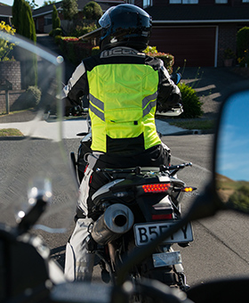 View of braking motorcycle from behind