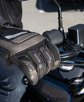 Close up of hand on brake