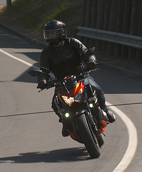 Street bike riding around a corner