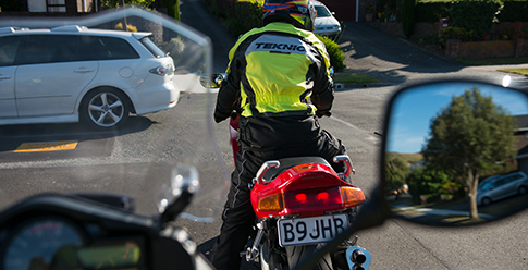 View of braking motorcycle from behind