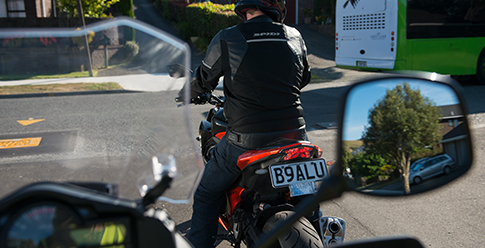 View of braking motorcycle from behind