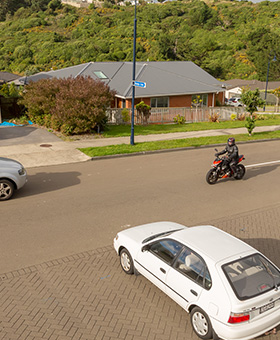 Bike riding with traffic waiting to turn